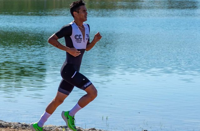 A PaceOn athlete on the run leg of a triathlon